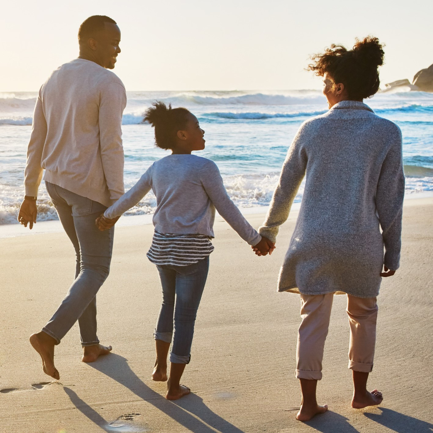 family-beach-sunset-3_500px family of three walking on the beach at sunset
